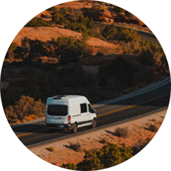 Campervan driving in desert