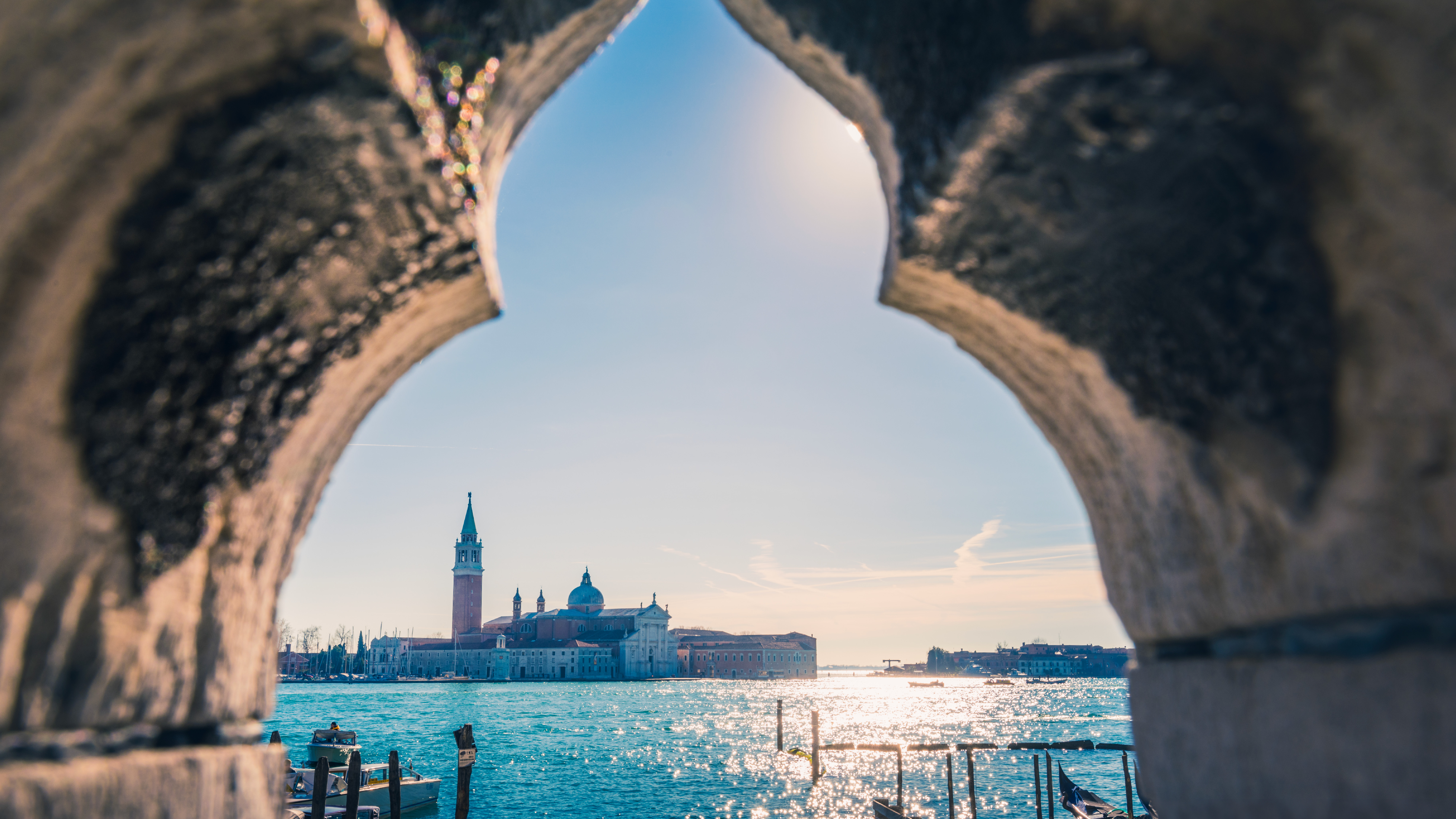 Woman overlooking ocean from railing of cruise ship